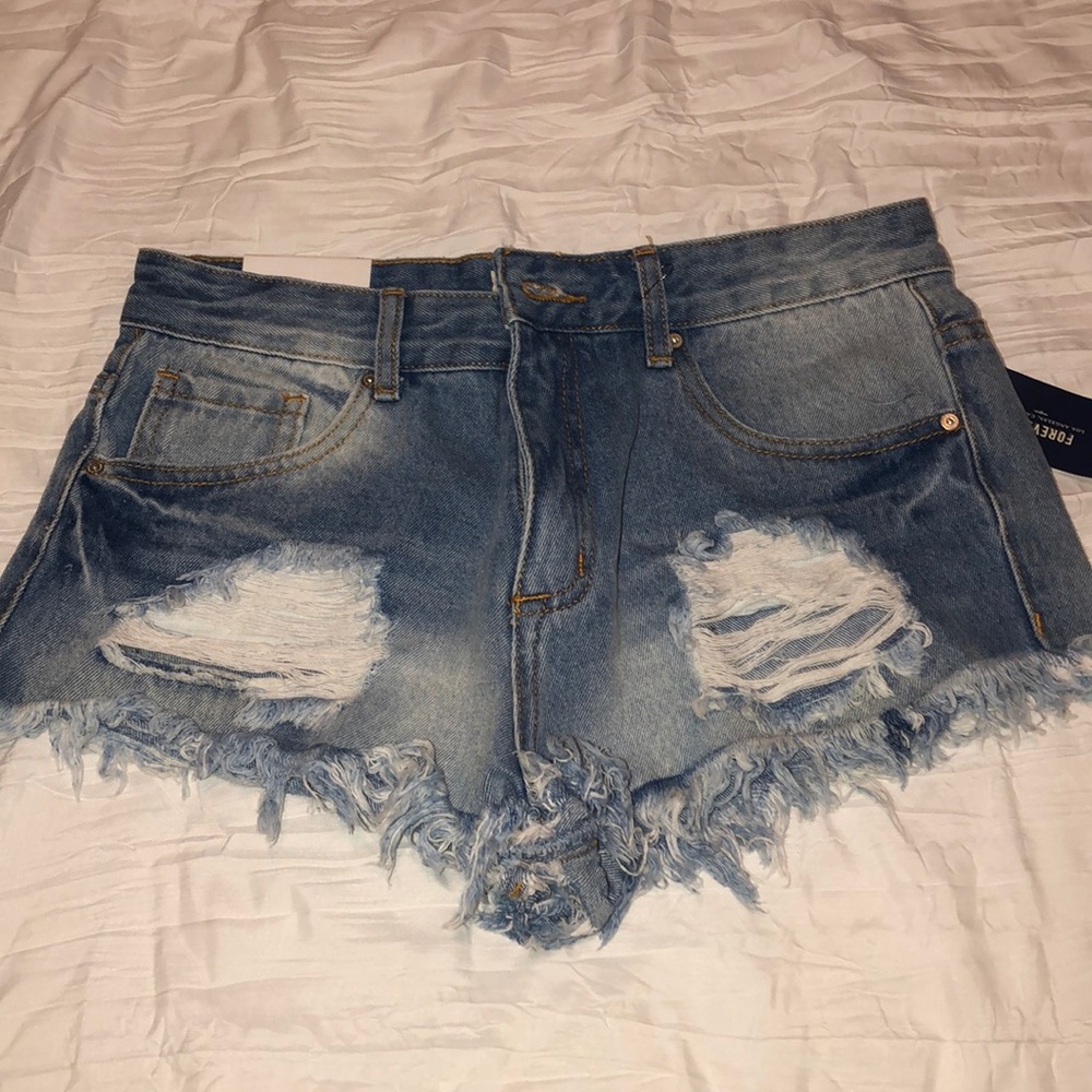 Distressed denim shorts
